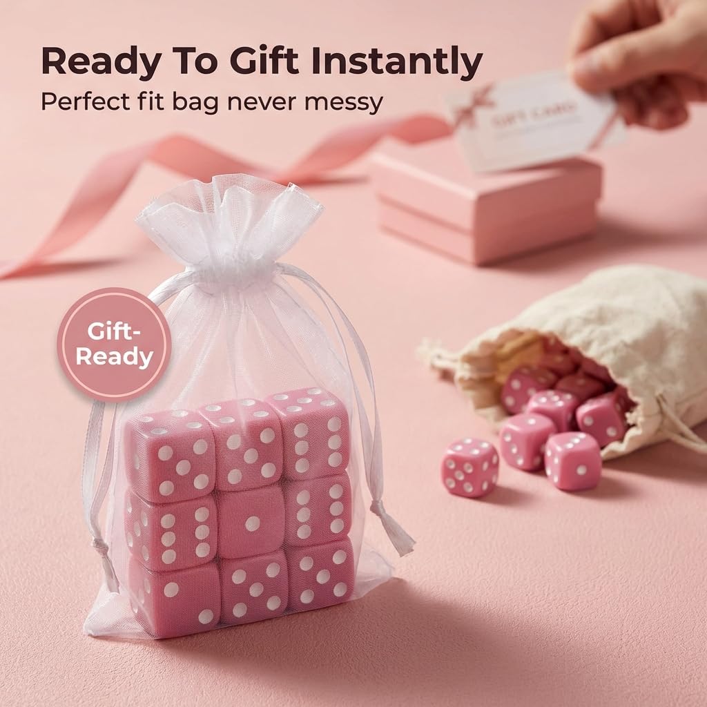 Pink dice in white organza gift bag, ready to gift